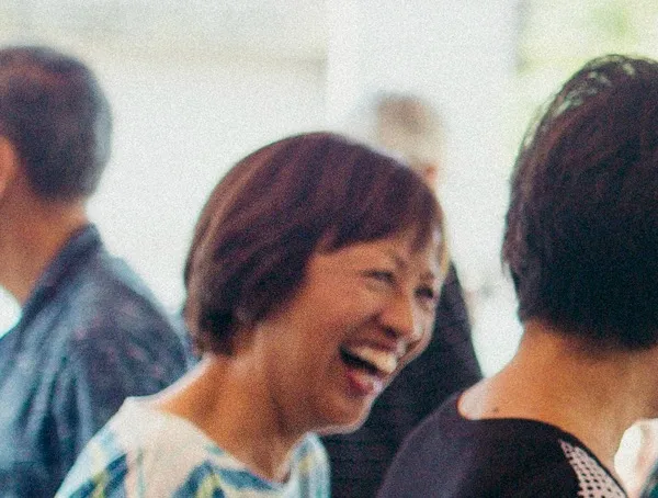 Church members laughing together during fellowship